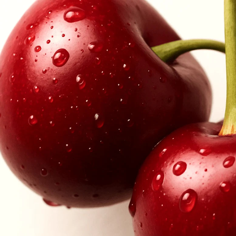 Bright red acerola cherries clustered on the stem