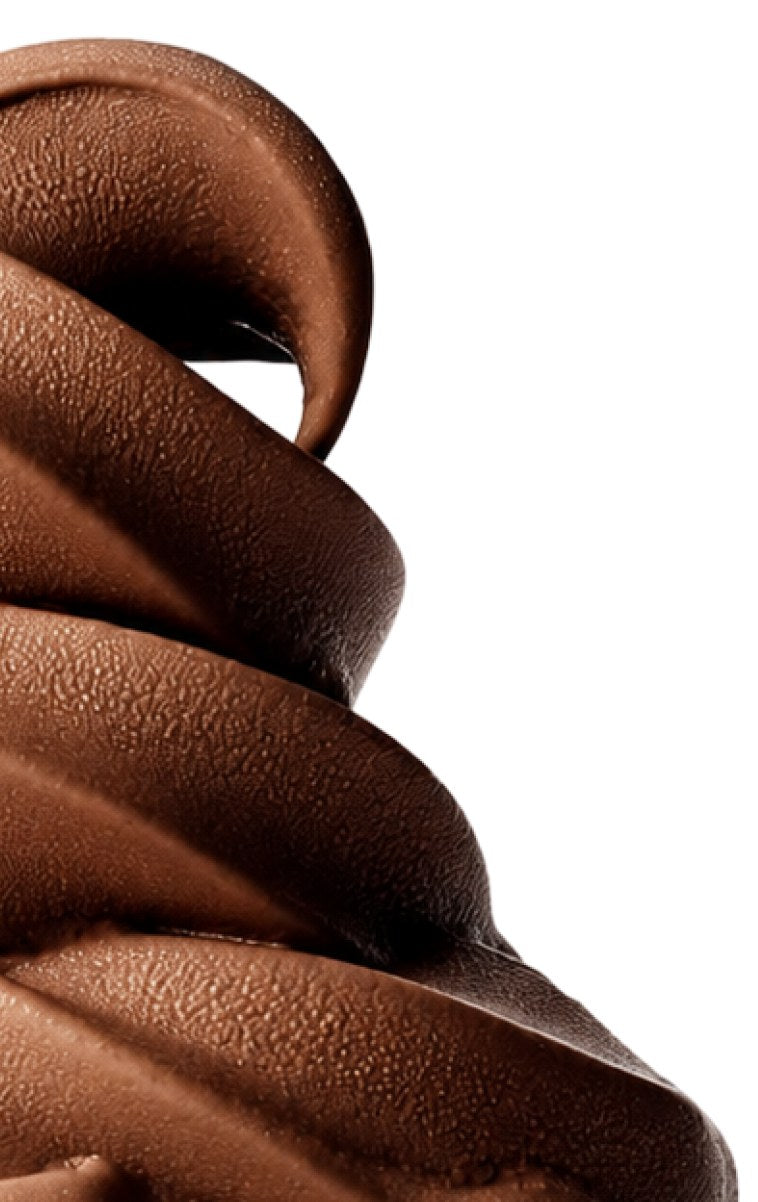 A glossy chocolate swirl, shaped like a perfectly formed poo